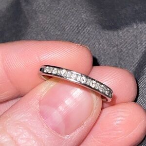 Round and Baguette Cut Diamonds set in 14K White Gold Half Eternity Band